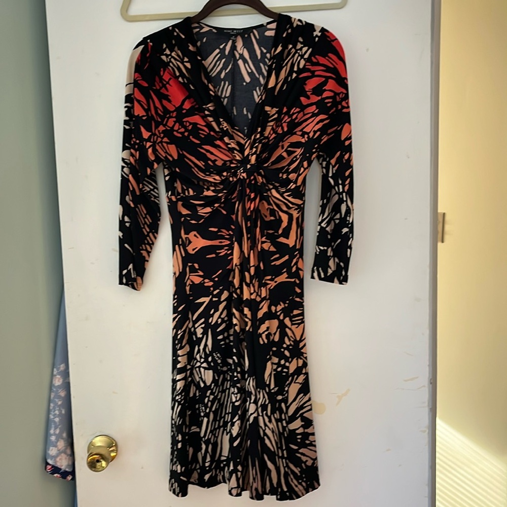 Size 4 dress (falls above the knee)